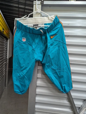 MIAMI DOLPHINS TEAM ISSUED/GAME USED TEAL NIKE PANTS 2014-2017 SEASON SIZE 40 Cover