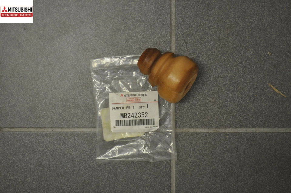 MITSUBISHI GALANT ECLIPSE REAR SUSPENSION SHOCK ABSORBER DAMPER NEW GENUINE OEM Foto 1 de 4