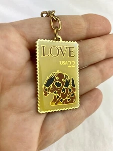 VTG The March Co USA 22 Postage Stamp Puppy Dog Metal Enamel Gold Love Key Chain - Picture 1 of 6