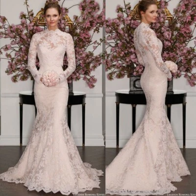 Vestido de novia de encaje sirena con ilusión chaqueta de manga larga y tren de barrido Foto 1 de 4