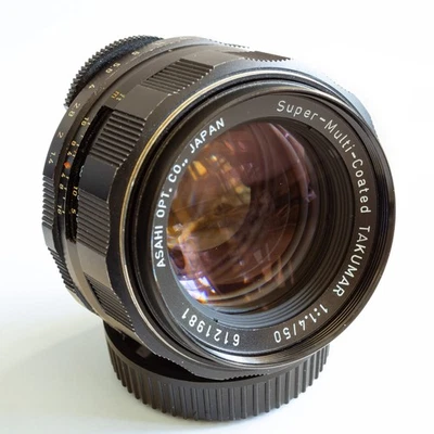 Super-Multi-Coated Takumar 50mm f1.4 M42 Lens w/ Caps - Image 1 of 4
