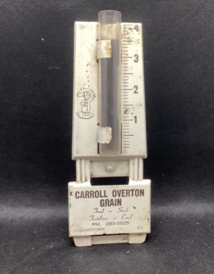 Medidor de lluvia vintage de metal con borde Carroll Overton Grain Co. Foto 1 de 4