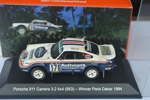 1:43 Porsche 911 Carrera 4x4 ganador Metge-Lemoygne París-Dakar 1984, sucio, embalaje original - Imagen 1 de 5