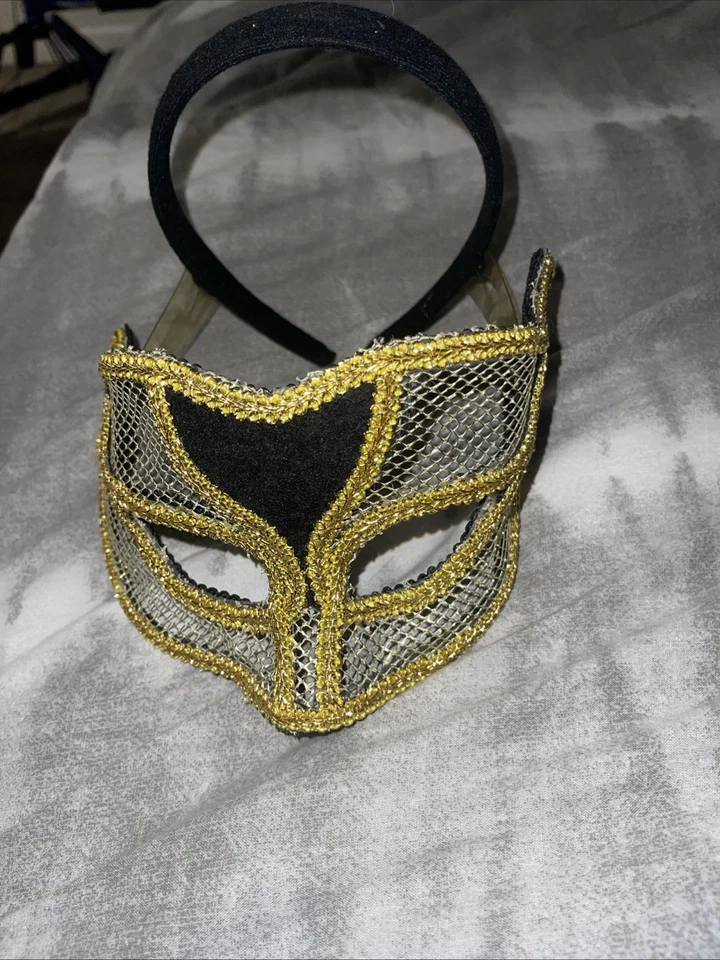 Máscara veneciana dorada con red para mujer Novedades Foto 1 de 4