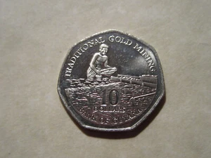 2007 Guyana coin 10 dollar  TRADITIONAL GOLD MINING  unc coins  neat coin - Picture 1 of 2