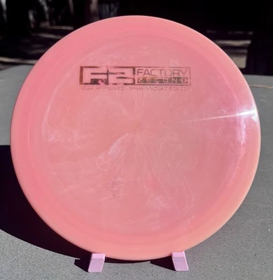 Innova Swirly Star Firebird 175 g tapa plana en relieve Foto 1 de 3