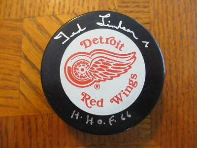 TED LINDSAY ДЕТРОЙТ КРАСНЫЕ КРЫЛЬЯ H.O.F. ОФИЦИАЛЬНАЯ ИГРОВАЯ ШАЙБА С АВТОГРАФОМ - Изображение 1 из 2