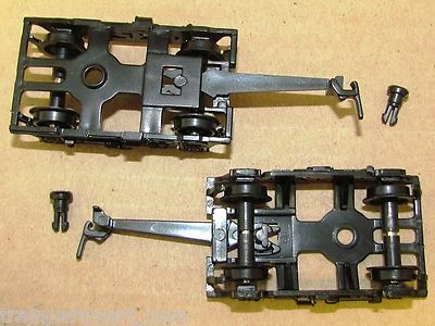 2 BLACK COMMONWEALTH 4 WHEEL PASSENGER CAR TRUCKS BY IHC W/ MOUNT PIN & HORNHOOK - Image 1 of 3