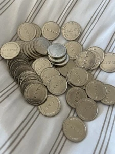 50 WIZARD OF OZ TOKENS ARCADE GAME COIN PUSHER SILVER ELAUT COINS - Picture 1 of 2