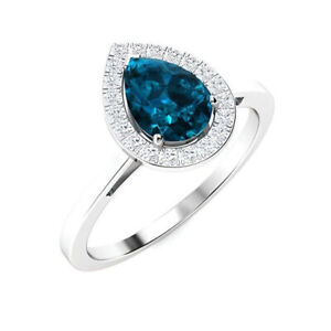 London Blue Topaz Pears 7x5mm Holo Accents Ring With Rhodium Plated