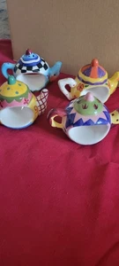 Set Of 4 Whimsical Ceramic Tea Pots Napkin Rings - Picture 1 of 7