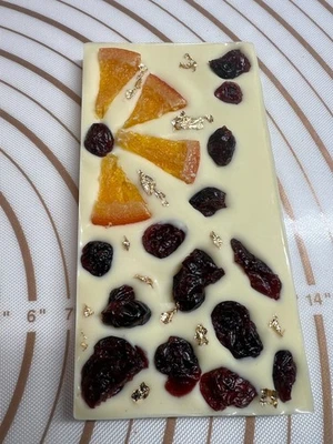 White Chocolate Bar fruit nuts Sweet taste topped Orange Cherrys & Gold 100g . - Image 1 of 4