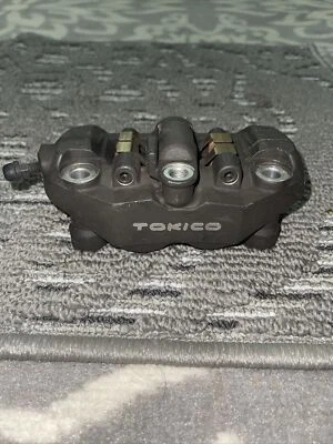 Suzuki GSXR1000 GSXR600 GSXR750 OEM Front Left Brake Caliper TOKIC 2005-2008 - Image 1 of 4