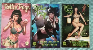3 Bettie Betty Page Dynamite Comic Books Alien Agenda Curse of the Banshee - Picture 1 of 5