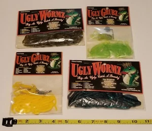 Neu 4 Packungen sortiert Ugly Wormz/Ugly Grubz Weichplastik Köder Würmer Spinner Maden - Bild 1 von 1