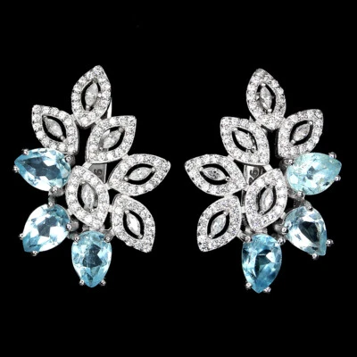 Orecchini In Argento Sterling 925 Con Topazio Blu Cielo Simulato 7x5mm - Immagine 1 di 4