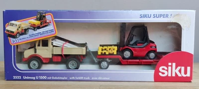 SIKU 2522 MERCEDES BENZ UNIMOG U 1500 WITH FORKLIFT TRUCK boxed - Image 1 of 4