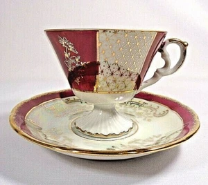 Taza y platillo Napco Japón, blanco y borgoña iridiscente, diseños y adornos dorados - Imagen 1 de 7