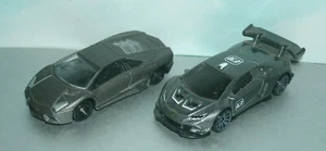 Two 1/64 Scale Lamborghini Diecast Cars - Reventon & Hurican LP620-2 SuperTrofeo - Picture 1 of 6