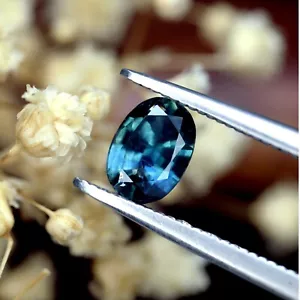 Zaffiro d'acqua naturale certificato impensabile 0,87 carati ovale australiano 6,6 x 4,7 mm - Foto 1 di 6