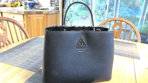 Cartera Harry Potter Reliquias de la Muerte con correa negra, usada una vez - Imagen 1 de 8