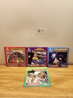 TACO BELL PROMO ATARI 2010 CD-ROM SET OF 4 DISCS SEALED - Image 1 of 4