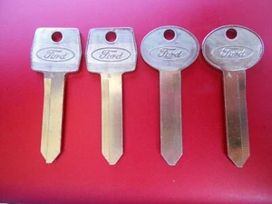 4 FORD LOGO KEY BLANKS 1967 - 1992 - Picture 1 of 2