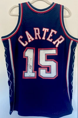 2024 Fanatics Under Wraps VINCE CARTER CAMISETA FIRMADA M&N NETS CERTIFICADO DE AUTENTICIDAD AZUL MARINO Foto 1 de 4