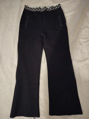 Брюки женские Louis Vuitton LV Monogram эластичные расклешенные укороченный подол средний размер для чтения - Изображение 1 из 4