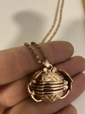 globe shaped rose Gold Tone Locket keeps 4 photos original by elegance jewelry - Image 1 of 4