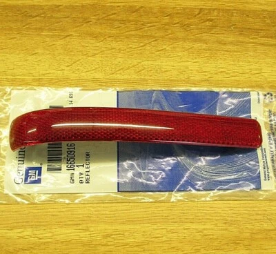 NOS GM 1994-1995-1996 CADILLAC DEVILLE REFLECTOR FITS RH OR LH FRONT DOOR PANEL - Image 1 of 4