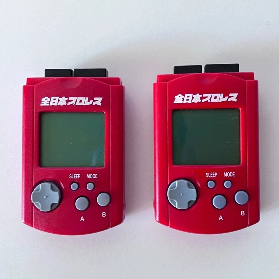 SEGA Dreamcast Red All Japan Professional Wrestling Visual Memory Unit VMU 2 Set - Image 1 of 4
