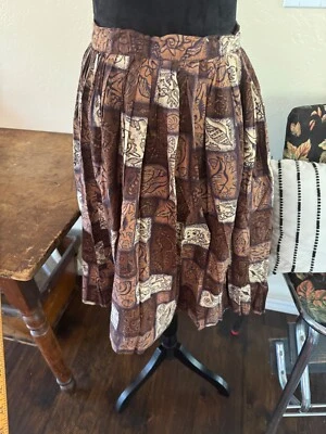 Vintage 1950s Brown Gold Seashell Novelty Print Hawaiian skirt - Image 1 of 4
