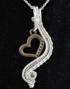 Bronze Heart handing on a Sterling Silver wrap accentuated by an uncut Emerald - Picture 1 of 2