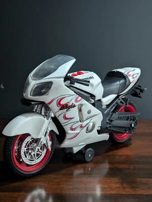 Motocicleta Ninja Kawasaki rara blanca juguete industrias estatales no funciona  Foto 1 de 4