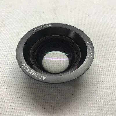 Nikon Zoom-NIKKOR 35-70mm f/1:3.3-4.5 Replacement Glass lens part - Image 1 of 4