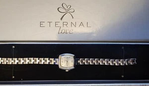 ETERNAL LOVE ROMAN NUMERALS WATCH IN PRESENTAION BOX NEW UNUSED WATCH ONLY - Picture 1 of 5