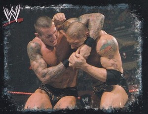Randy Orton Batista 2009 Topps WWE Rivals Album Stickers Card #3 Spanish Version
