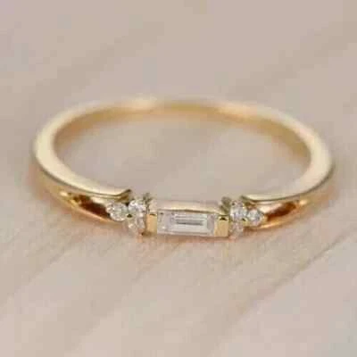 Anillo de boda para mujer de diamantes creados en laboratorio de corte baguette de 1 quilate enchapado en oro amarillo de 14 quilates Foto 1 de 4