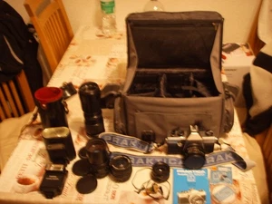 Praktica super tl 1000 Spiegelreflexskamera mit sehr viel Zubehör (siehe Fotos) - Bild 1 von 19