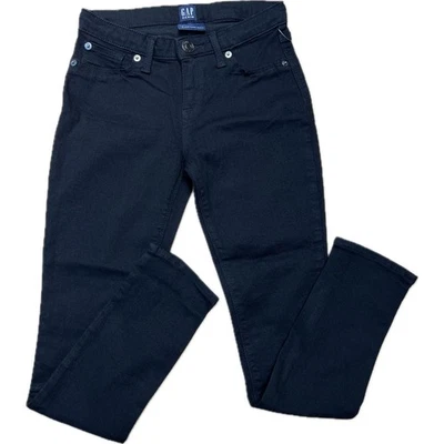 Pantalones de mezclilla súper ajustados elásticos negros Gap para niños y niñas talla 10 Foto 1 de 4