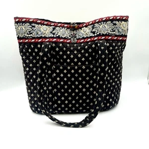 Vera Bradley Vera tote bag in a black quilted pattern with a floral trim - Picture 1 of 8