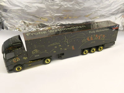 ** Herpa 303941 Volvo FH Gl. XL Box Semitrailer Herpa Weihnachtstruck 2014 1:87 - Image 1 of 2