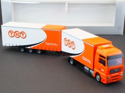 AMW AWM MAN TGA 18.430 Gigaliner TNT Global Express Mint! OVP 1705-21-81 - Image 1 of 4