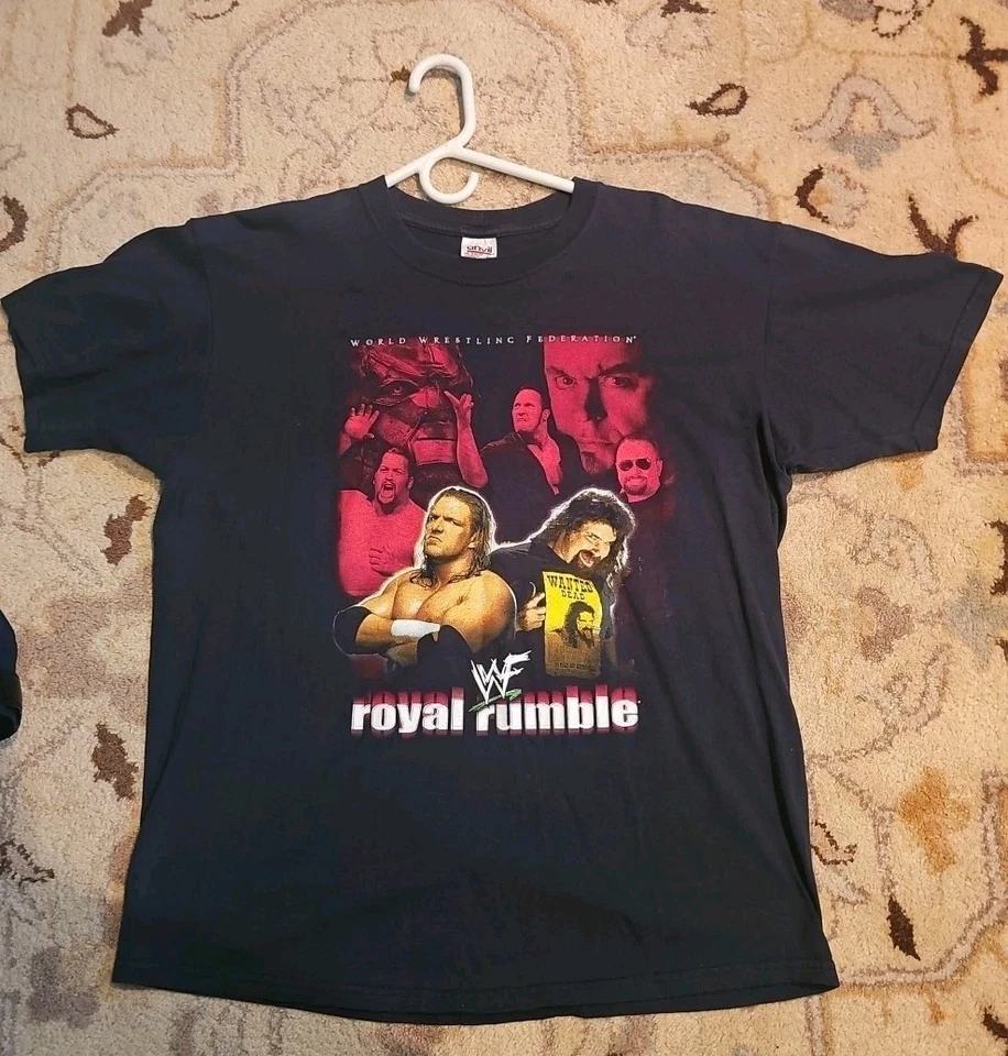 CAMISETA VINTAGE WWF 2000 ROYAL RUMBLE TAMANHO XL RARA WWE CACTUS TRIPLE H NUNCA USADA - Imagem 1 de 4