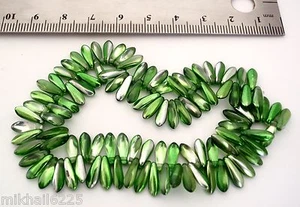 50 3 x 11 mm Czech Glass Daggers: Coated - Metallic Green/Silver - Picture 1 of 1