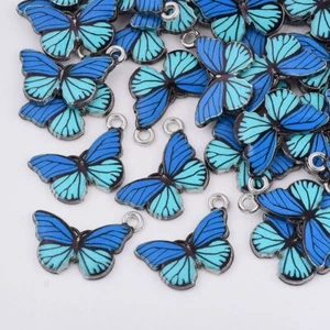 10 Stunning Blue/ Turquoise Butterfly Shaped Silver Tone Charm Pendants - Picture 1 of 2