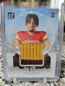 2024 Donruss RC Jayden Daniels Rookie Sweaters (2-Color Patch Sweater) #RHS-JDA - Picture 1 of 2