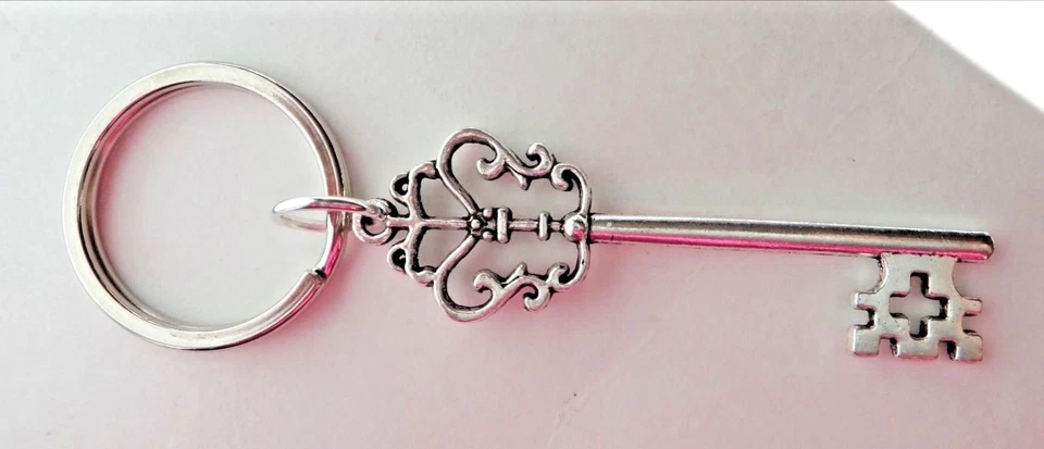 Pewter Silver 57x18mm Pretty Skeleton Key on a 27mm Keychain Keyring - Image 1 of 1