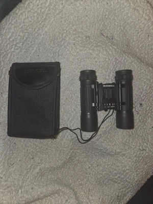 Bushnell conpact foldable binoculars 10 x 25 - Image 1 of 2